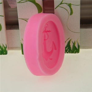 Pink silicone mold with anchor design for soap, candles, and cake decorating