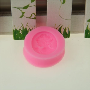 Pink silicone mold featuring a detailed Victorian lady portrait relief for fondant DIY