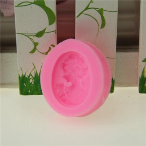 Pink silicone mold featuring an elegant lady cameo relief for fondant and DIY crafts