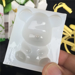 Translucent silicone bear mold for UV resin crafting with a sitting bear silhouette