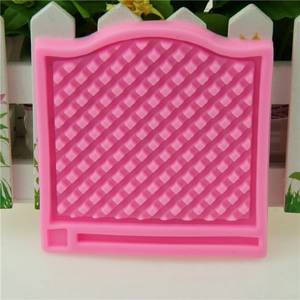Pink silicone fondant mold with diagonal grid pattern for DIY cake border decoration