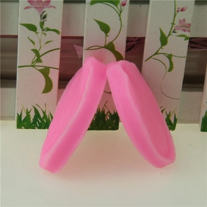 Pink silicone lily leaf and orchid petal press molds for fondant cake decorating