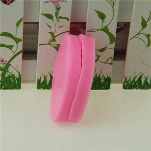 Side view of pink silicone flower petal mold showing thickness for fondant cake decoration