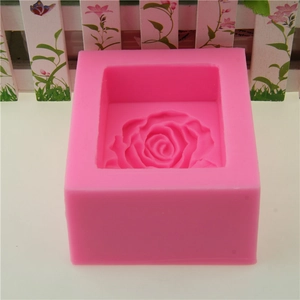 Pink silicone mold for handmade soap and cakes with large rose flower carving design