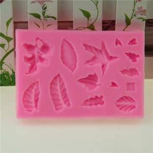 Moule en silicone rose avec divers motifs de feuilles pour décorations de gâteaux