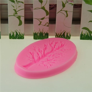 Pink silicone mold with branch and leaf textures for fondant or chocolate cake decor