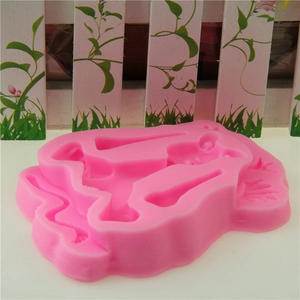 Detail showing the pink silicone lion mold with cute animal cavities for cake decorating