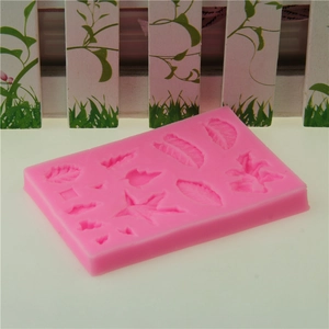 Moule à fondant en silicone rose avec divers motifs de feuilles pour décoration de gâteau