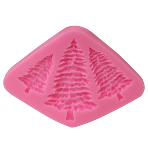 Detailed pink silicone fondant mold featuring three layered Christmas tree patterns for baking