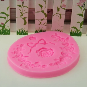Pink silicone rose flower and ribbon bow fondant mold for cake decorating and baking