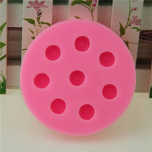 Pink 8-hole silicone blueberry fondant mold for cake decorating and chocolate baking