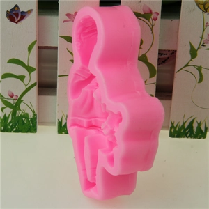 Pink silicone baby bear doll mold for fondant cake decorating and DIY chocolate crafting
