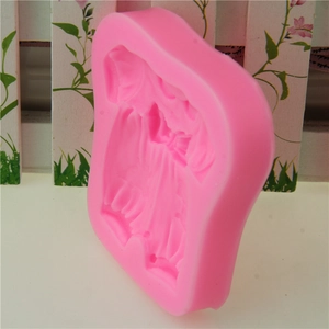 Pink silicone baby dress mold with bow for fondant, cake decorating and DIY crafts