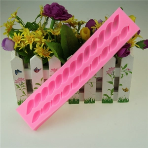 Pink silicone fondant cake mold with twisted rope texture for DIY baking and decoration