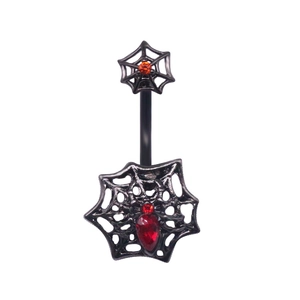 Gothic black spider web belly ring with red and orange crystals on a curved steel bar