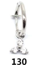 Detailed macro view of silver steel hoop earring with three clear crystal stone cluster