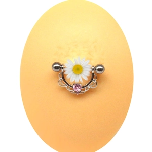Pink and white zircon nipple shield with floral lace detail on silicone body model