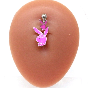 Detail of silver belly ring featuring pink bunny pendants on skin-toned silicone model