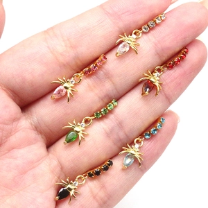 Set of six gold-plated spider earrings with water-drop crystals in diverse colors