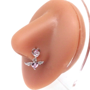 Surgical steel nose stud with pink zircon heart and angel wings pendant on nose model