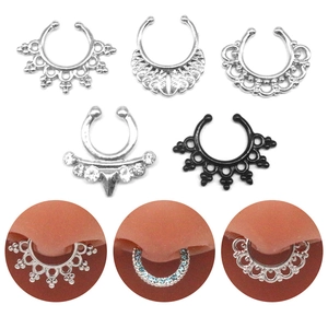 Skull and boho style clip-on septum rings set in silver and black metal with rhinestones
