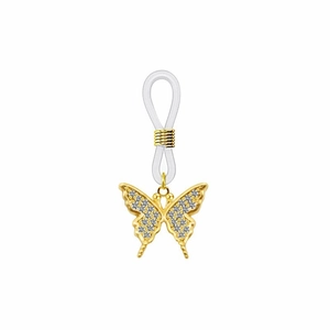 Détail du charme papillon doré avec cristaux blancs et connecteur en silicone transparent