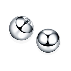 Close-up of polished G23 titanium balls with internal threading for body piercing jewelry