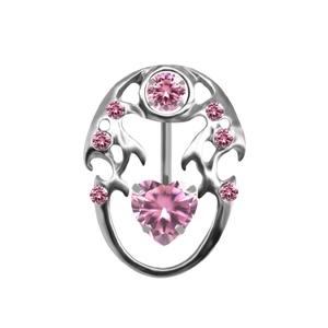 Macro detail of silver naval piercing with pink heart-shaped crystal and vine frame