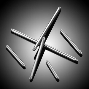 Macro shot of polished G23 titanium straight threaded barbell posts for body jewelry