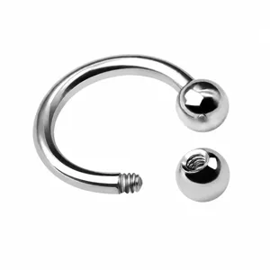 Macro detail showing high-precision screw threads on G23 solid titanium horseshoe barbell