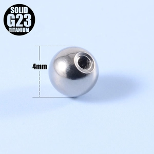 Macro detail of 4mm solid G23 titanium ball with internal thread for body piercing