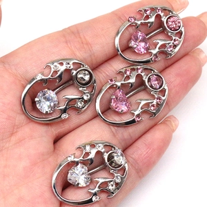 Surgical steel belly rings set with heart-shaped pink and clear cubic zirconia stones