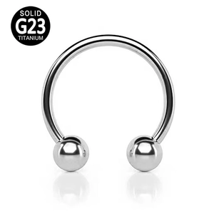 Solid G23 titanium horseshoe piercing ring with polished silver finish and removable balls
