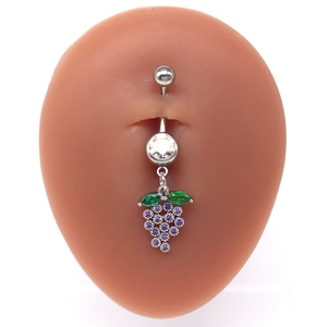 Grape-shaped belly ring with purple zircons and green leaves on a silver curved barbell