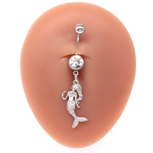 Detailed view of silver mermaid belly ring with sparkling cubic zirconia on body model