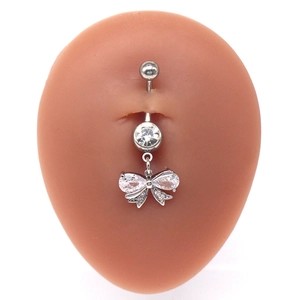 Bowknot navel ring with crystal pavé and silver stainless steel barbell on navel model