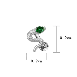 Primer plano de pendiente de serpiente plateado con una piedra de circón verde