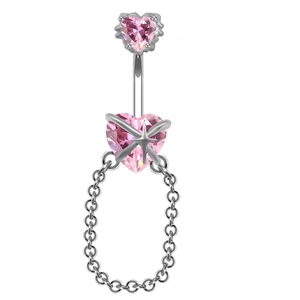 Piercing de ombligo con circonitas rosa corazón, estrella y cadenas en fondo blanco