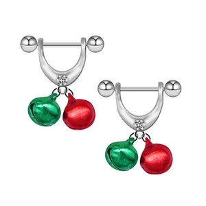 Macro detail of stainless steel nipple rings with festive red and green bells