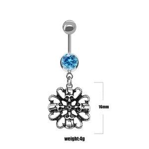Detail of retro punk navel ring with blue zircon and 16mm skull pendant ornament