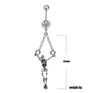 Detail view of punk skull navel ring with 45mm pendant length and silver metal finish