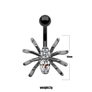 Detailed view of punk spider navel ring with black metal rod and clear sparkling zircons