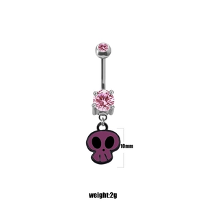 Detail of belly ring with pink stones and a purple skull pendant measuring 10mm height