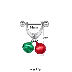 Macro view of Christmas nipple ring with red and green bells and 14mm inner diameter