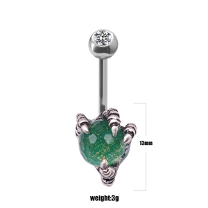 Detailed view of punk spider claw navel ring with green gemstone and clear zircon