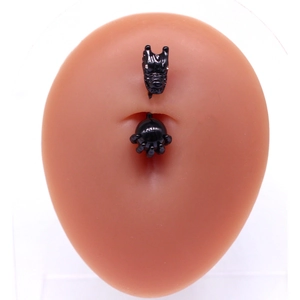 Macro shot of Gothic black dragon belly ring featuring detailed dragon head and claw