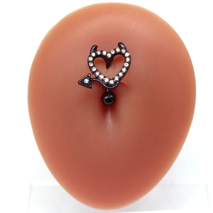 Detailed view of black bat heart belly button ring with rhinestones on skin model