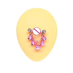 Detail of silver barbell nipple ring featuring five hanging pink bells on a skin model