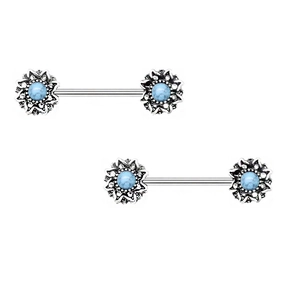 Detail of bohemian nipple ring with floral pattern and blue faux turquoise stones