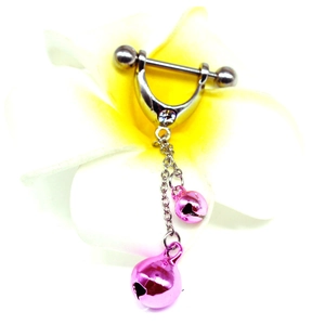 Macro shot of stainless steel nipple ring featuring pink bells and a sparkling crystal